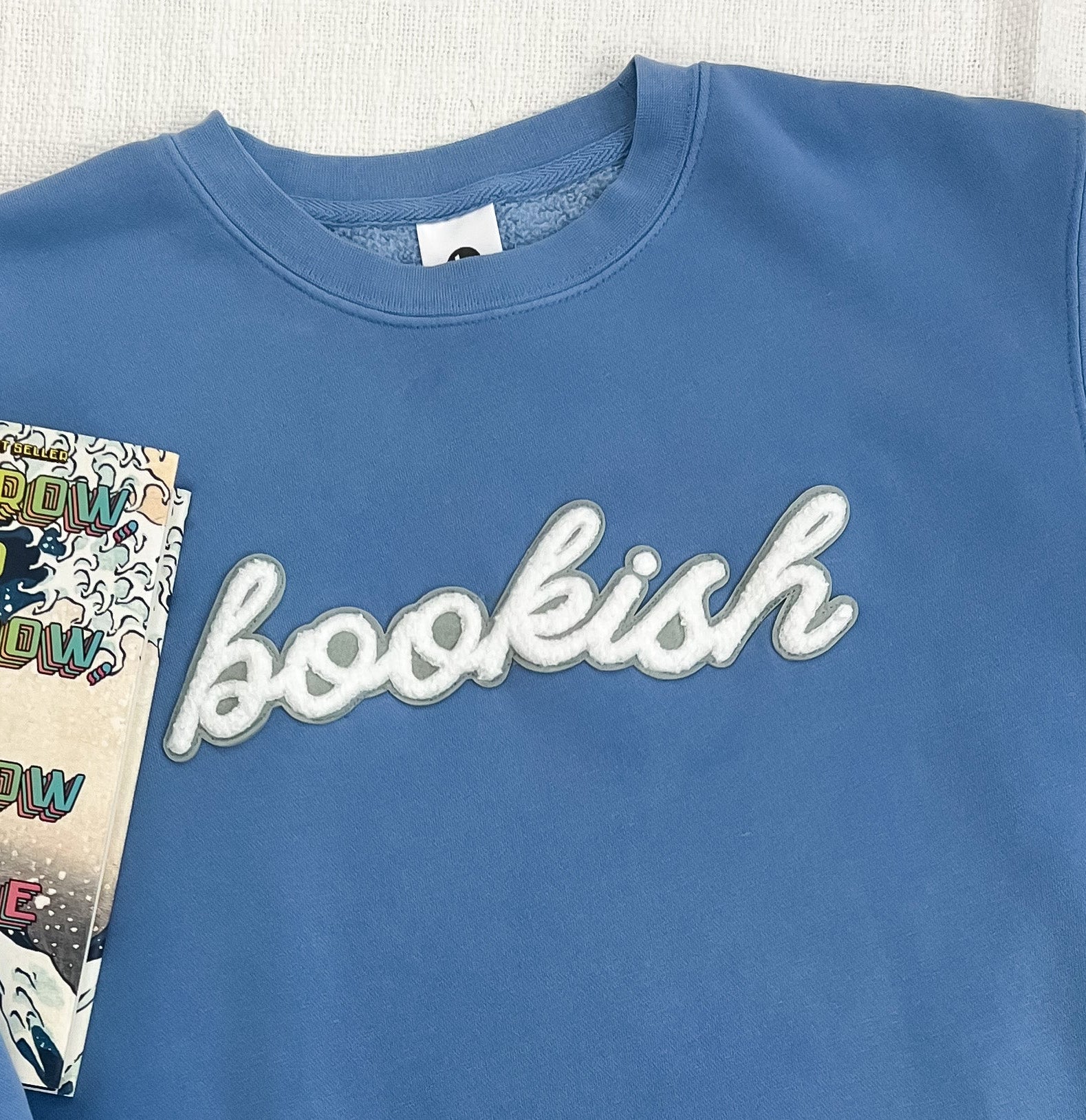 Bookish. Patch Sweatshirt - Light Blue